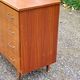 Chest of drawers from the 50s-60s in golden mahogany 4 drawers feet bobbin