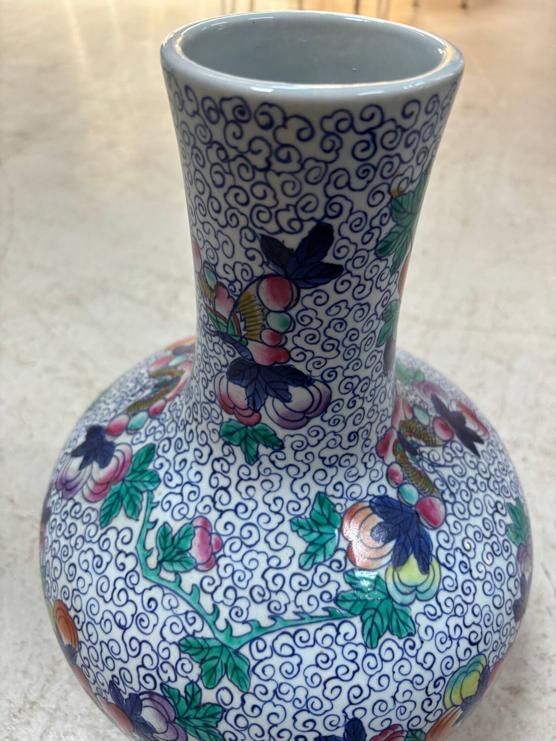 CHINA Polychrome porcelain vase decorated with butterflies Signed under the base 43cm