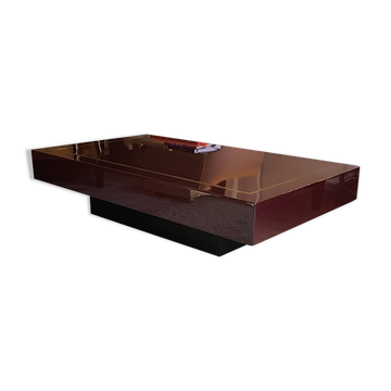 Burgundy lacquered coffee table with brass by Jean-Claude Mahey.