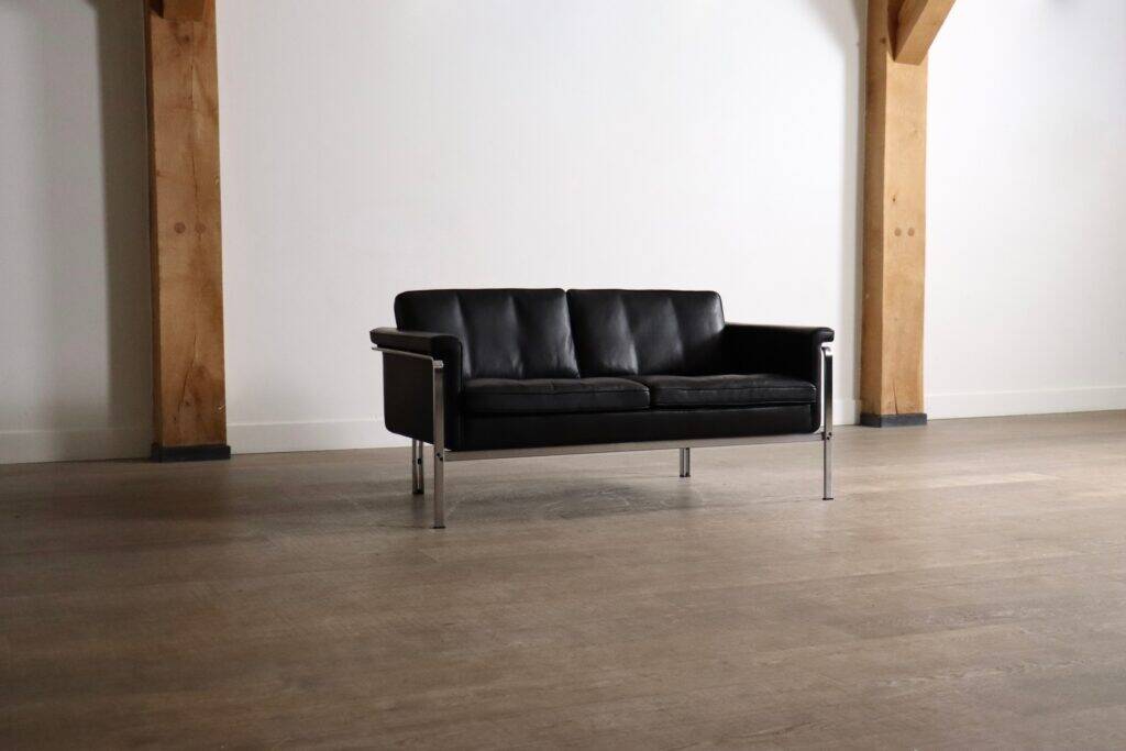 Horst Brüning Model 6912 two seater sofa in black leather for Kill International, Germany 1967