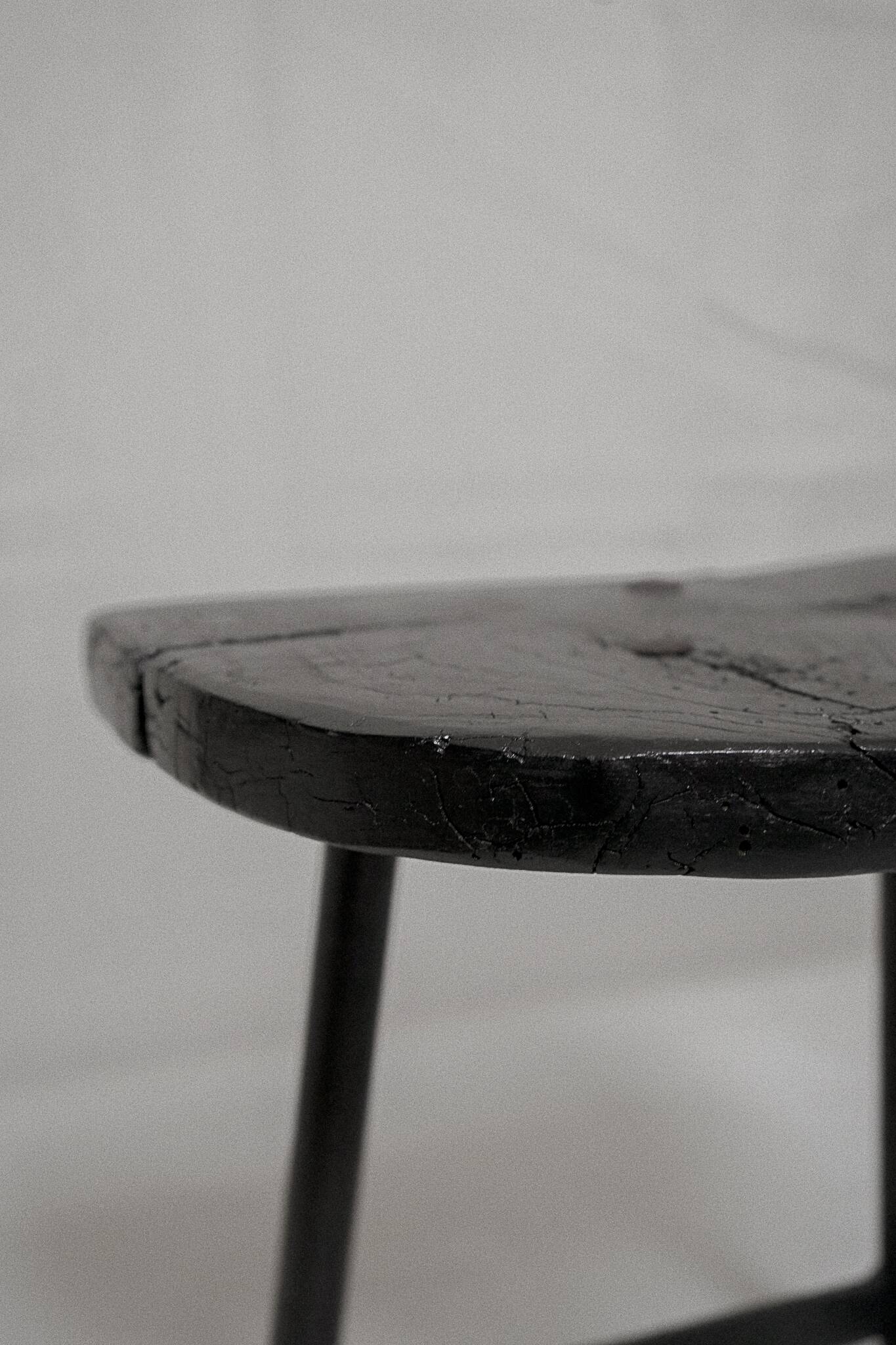The small burnt wood tripod
