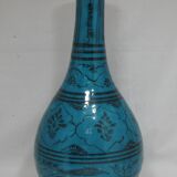 Vase en céramique islamique à fond turquoise