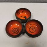 Beautiful bowl (composed of 3 bowls) with orange/red glaze inside