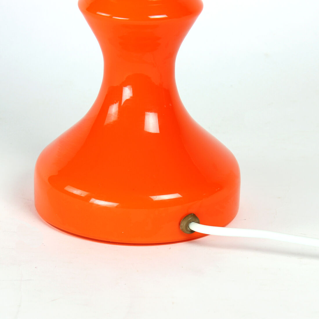 Orange glass table lamp by vitropol, poland 1960s