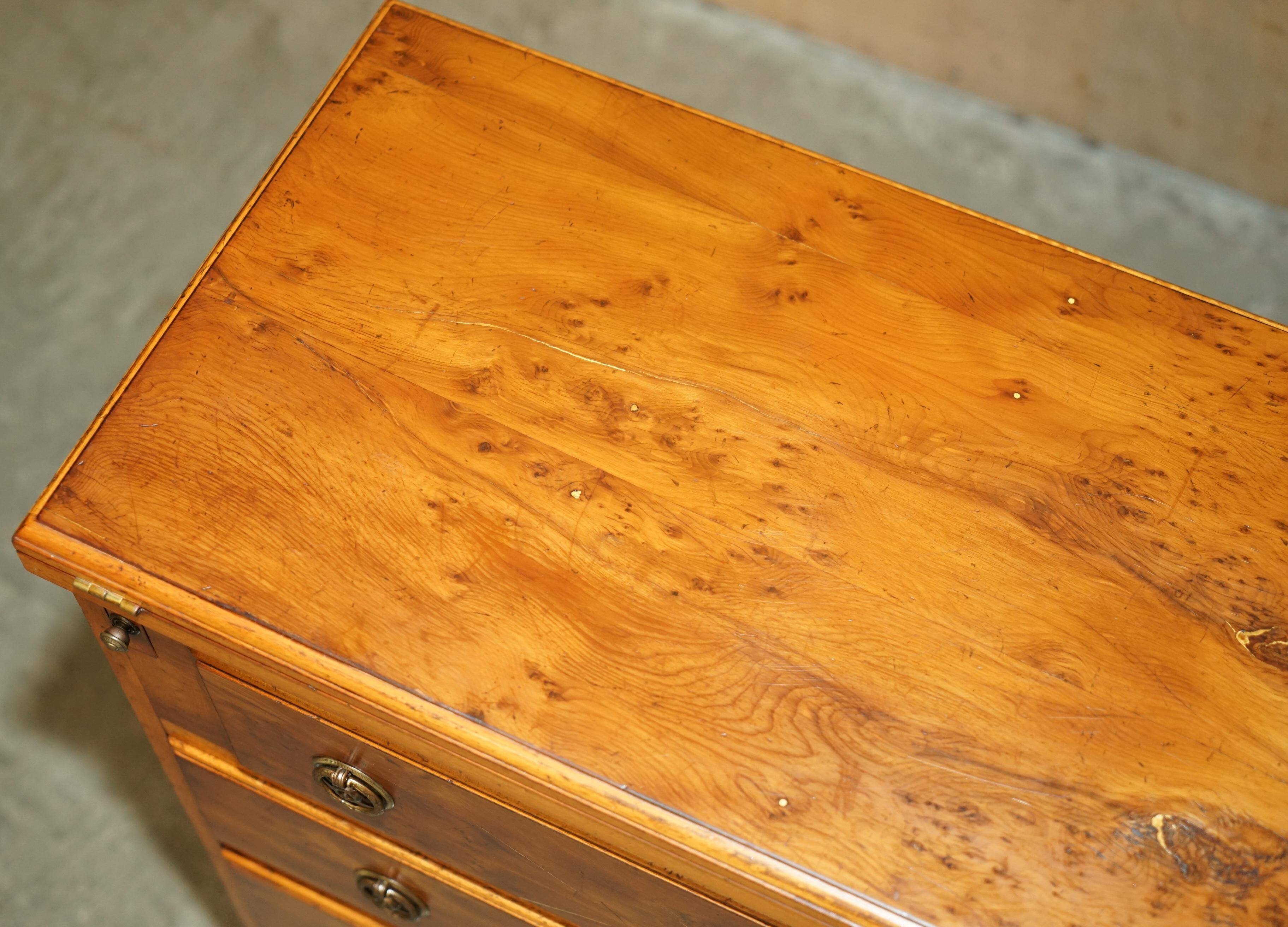 Vintage walnut commode with sliding top in Butler style.