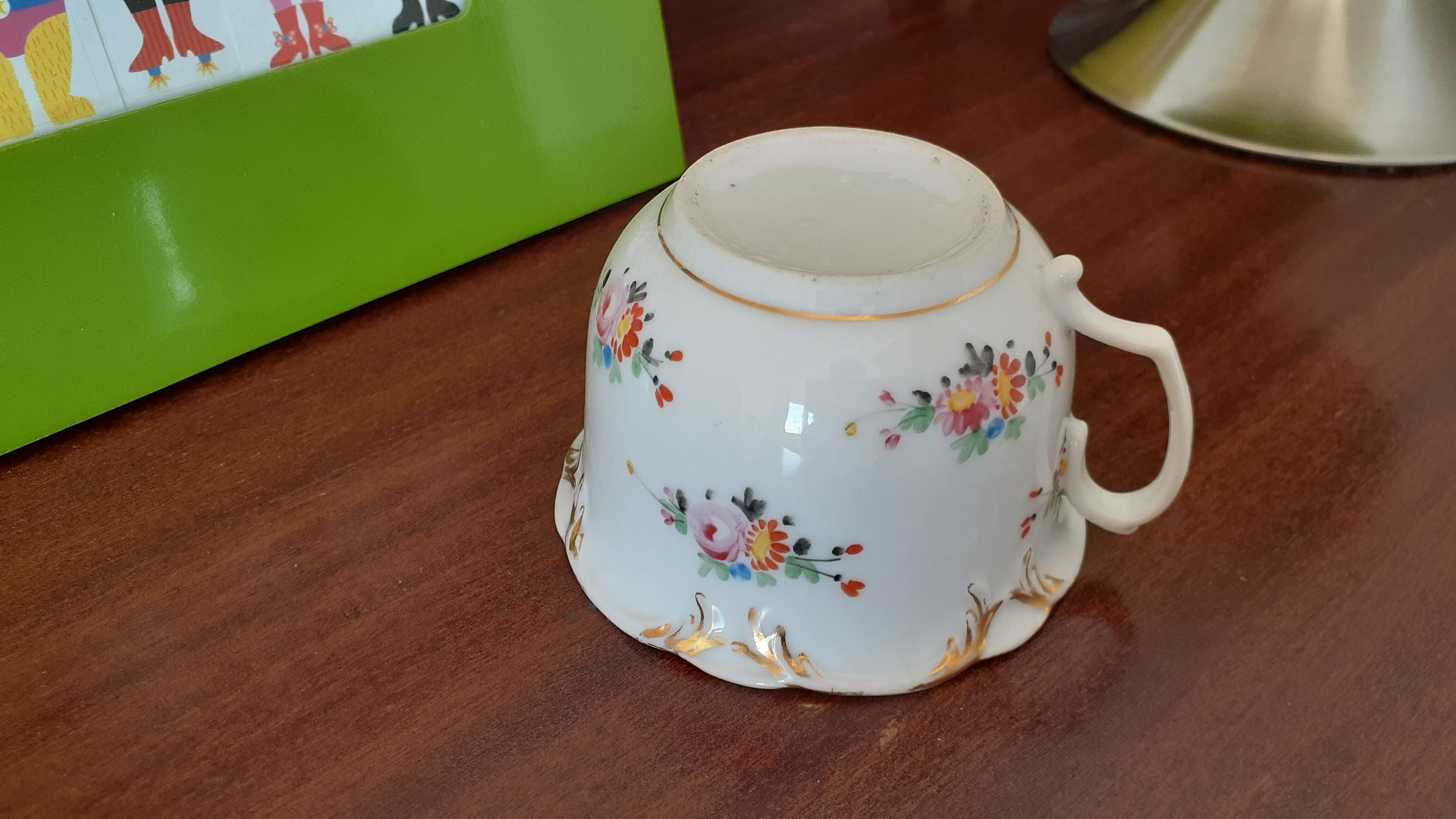 Antique flowered porcelain cup