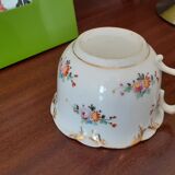 Antique flowered porcelain cup