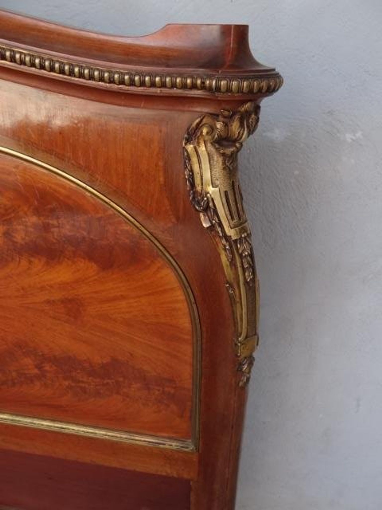 Golden bronze Louis XVI style mahogany bed