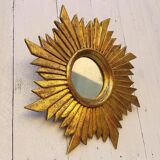 Sun mirror in gilded wood vintage decoration