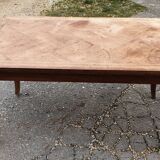 Coffee table with solid walnut geometric decoration