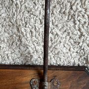 Old coat rack with metal/brass hooks