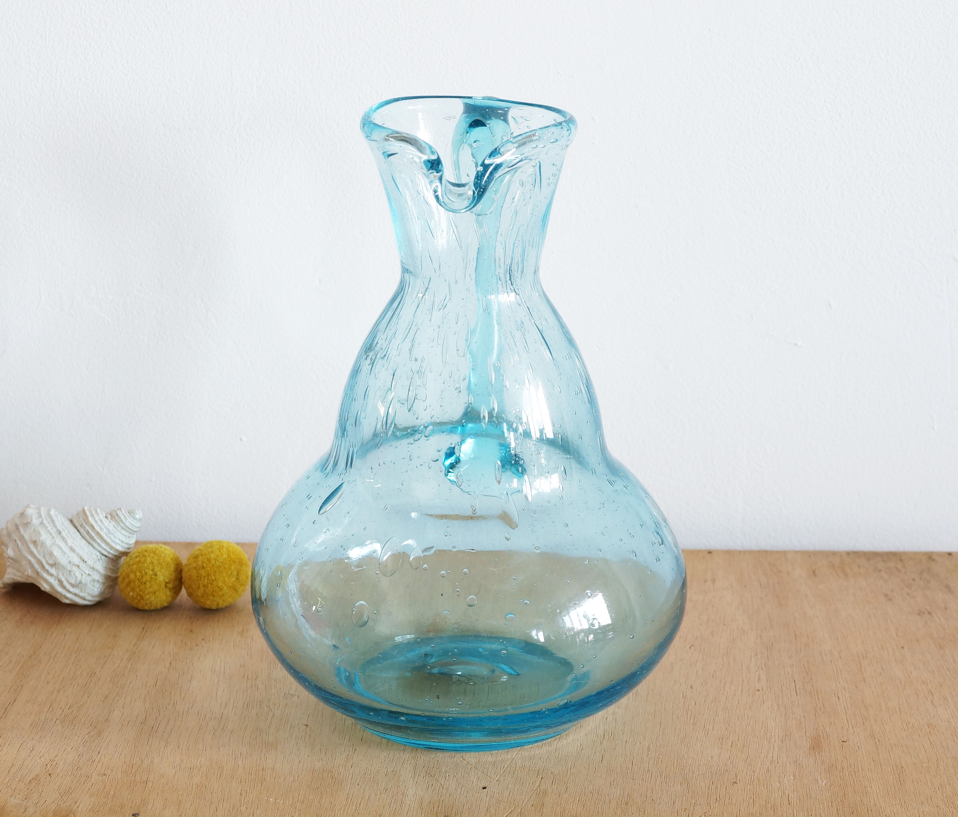 Blue carafe in bubble blown glass