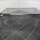 Chromed metal coffee table with smoked glass top from the 70s