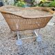 Wicker cradle on wheels, late 19th century