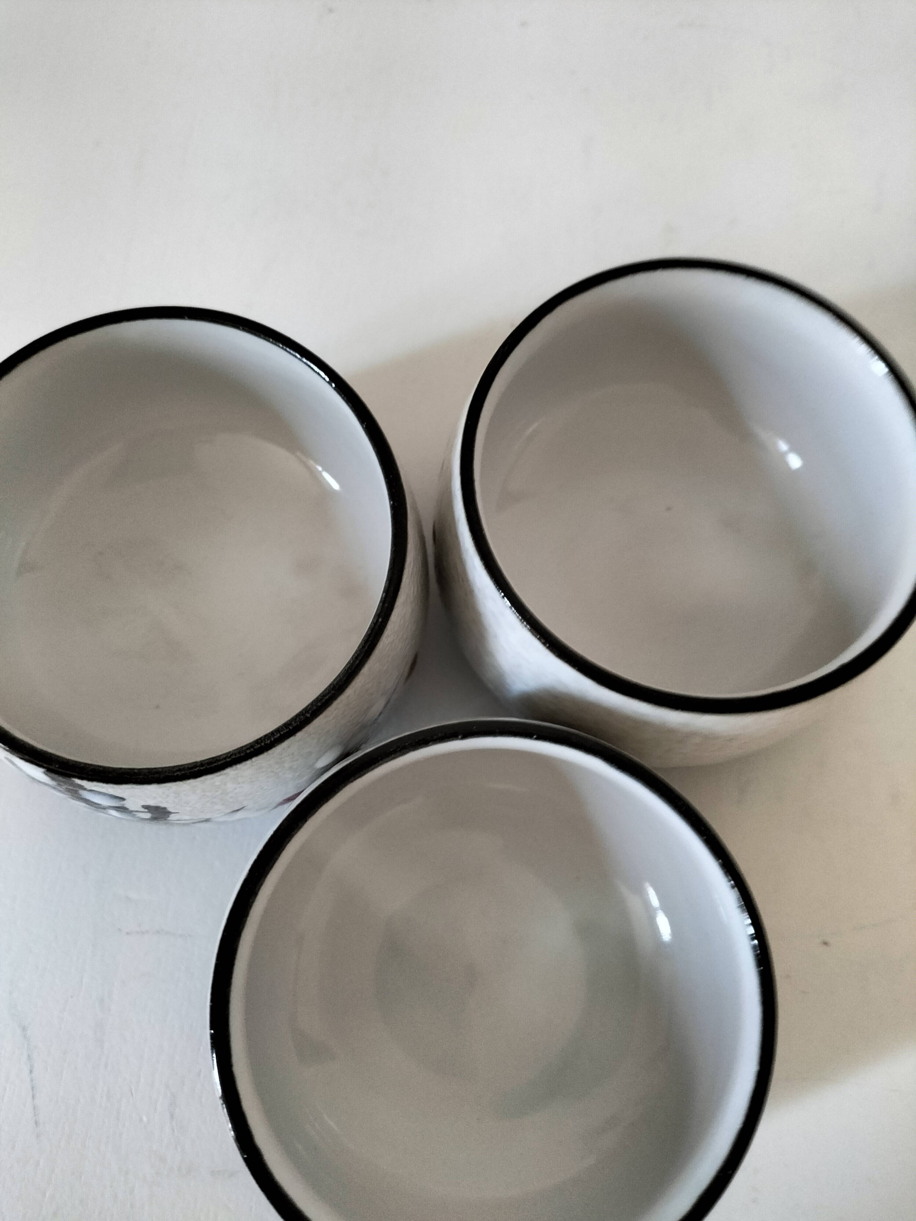 Three glazed ceramic bowls with raised graphic decoration, 1970s.