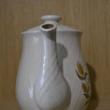 Teapot with yellow flowers