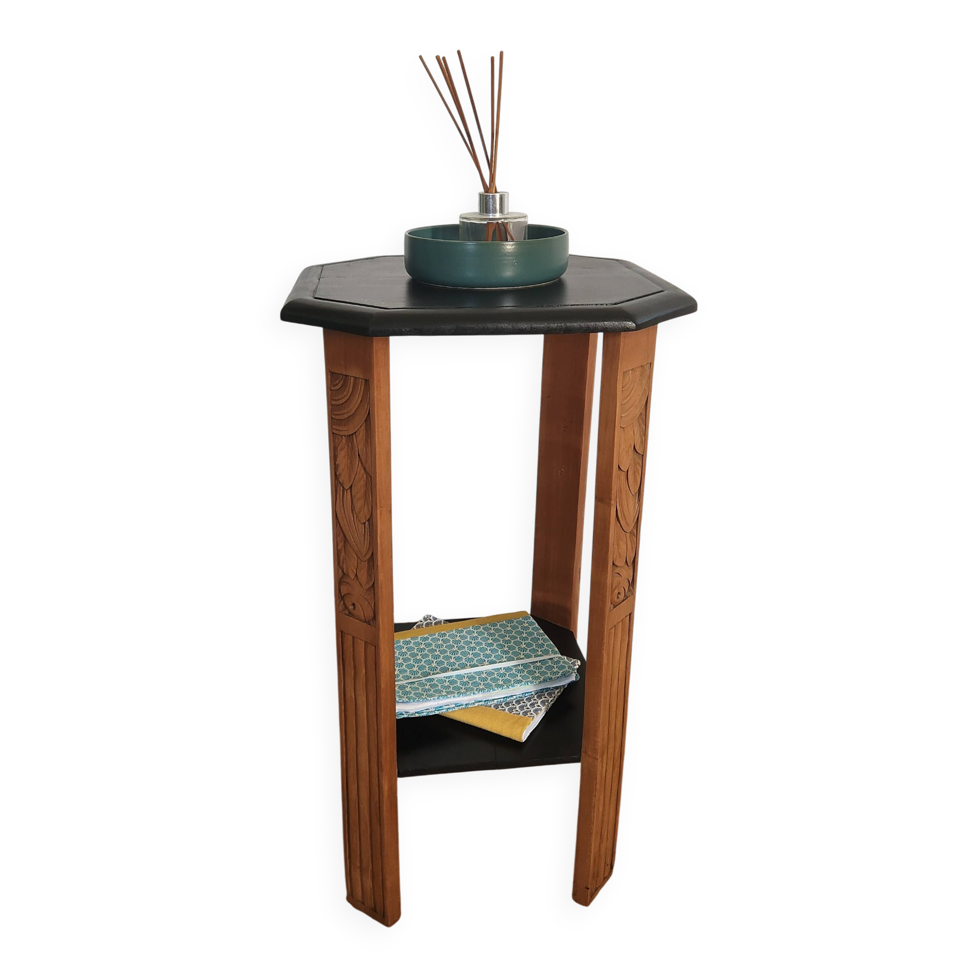 Art Deco console with sculpted black lacquered legs.