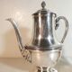 Louis XVI style silver-plated teapot and milk jug
