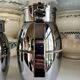 2 Hermès insulated jugs in chrome metal and covered leather.