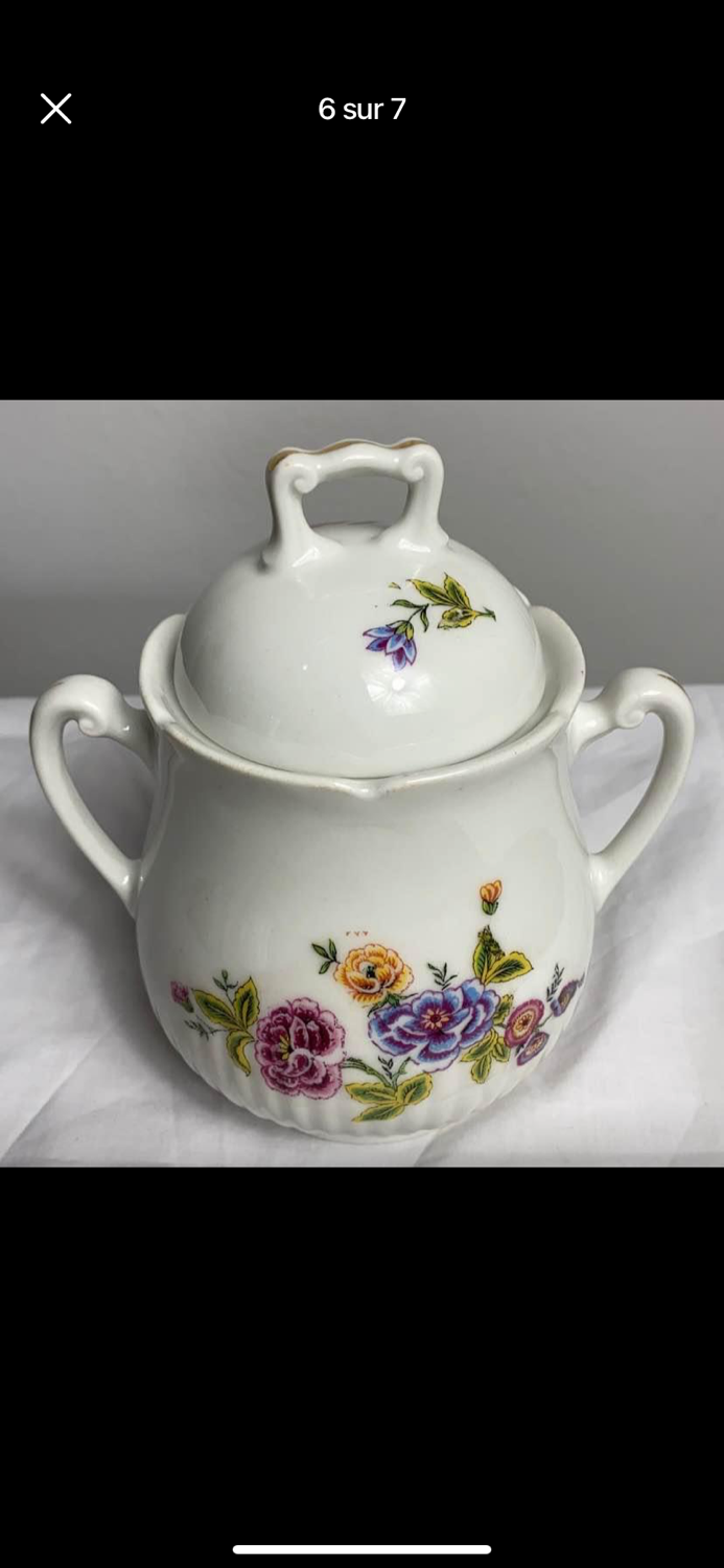 Antique porcelain teapot and sugar bowl