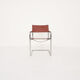 Tubular dining chair with arm rests, 1970's