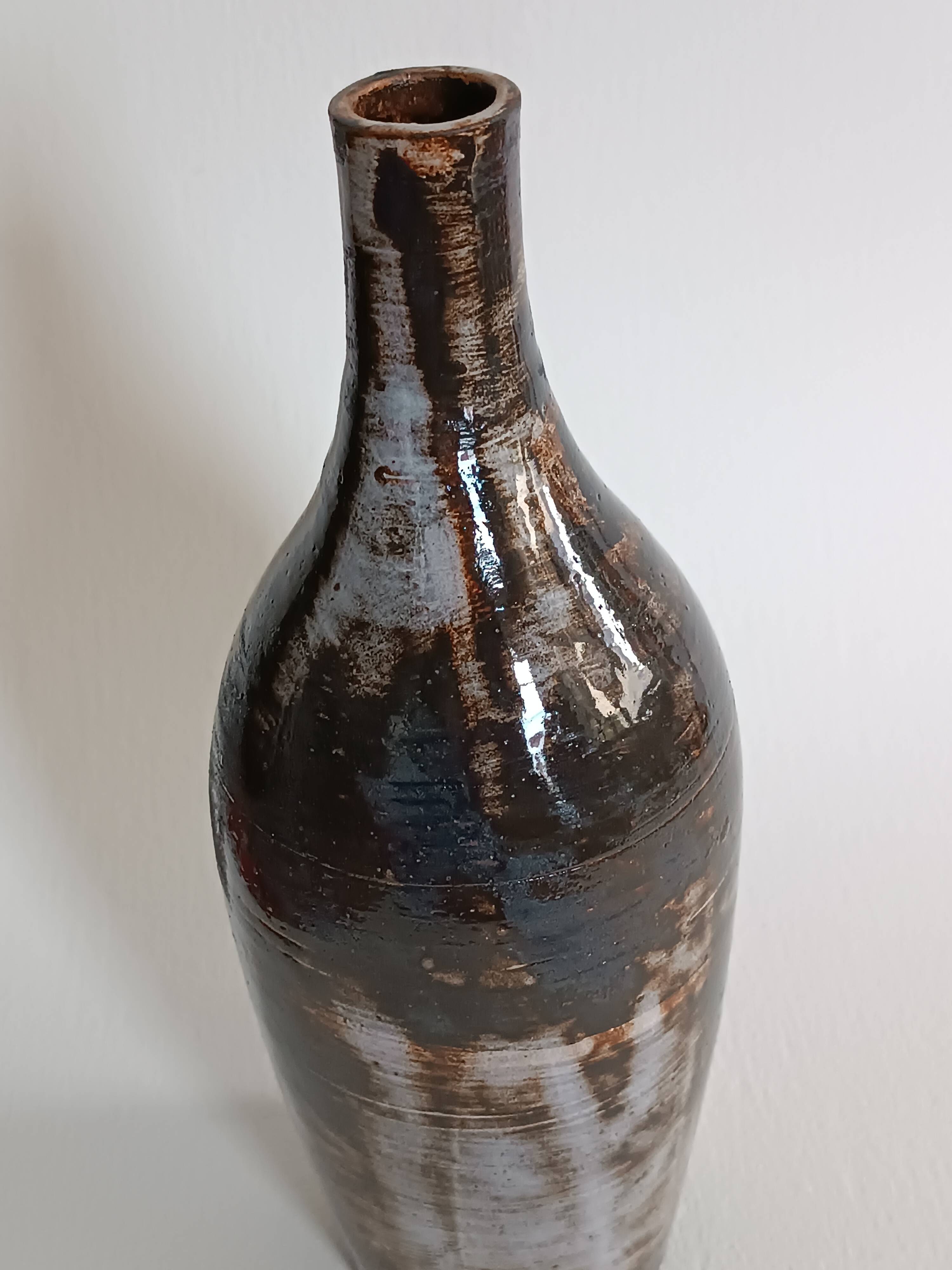 A bottle and six ceramic cups by Gérard Hofmann Vallauris 1950.