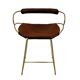 Contemporary sculptural bar stool with a metal back in aged brass and cognac leather.
