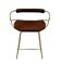 Contemporary sculptural bar stool with a metal back in aged brass and cognac leather.