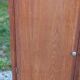 Vintage oak wardrobe with metal legs from the 1950s.
