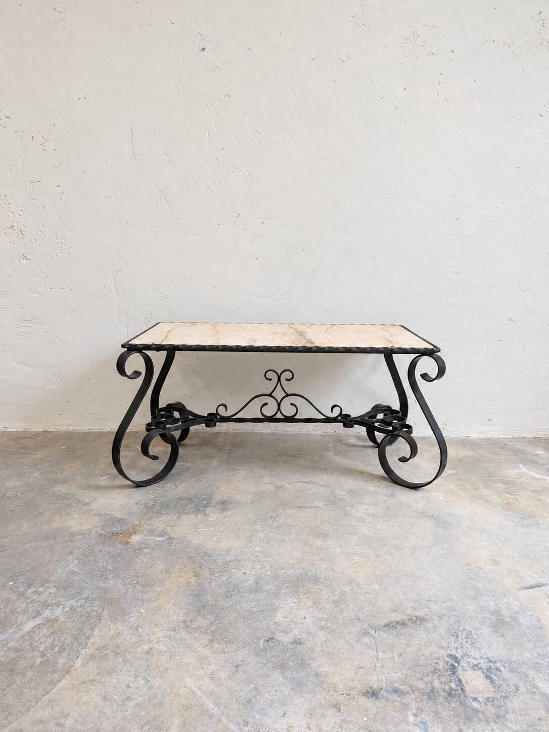 Coffee table in marble and wrought iron, Mediterranean spirit.