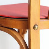 Bistro chair with bars of the 50s in wood and imitation red leather