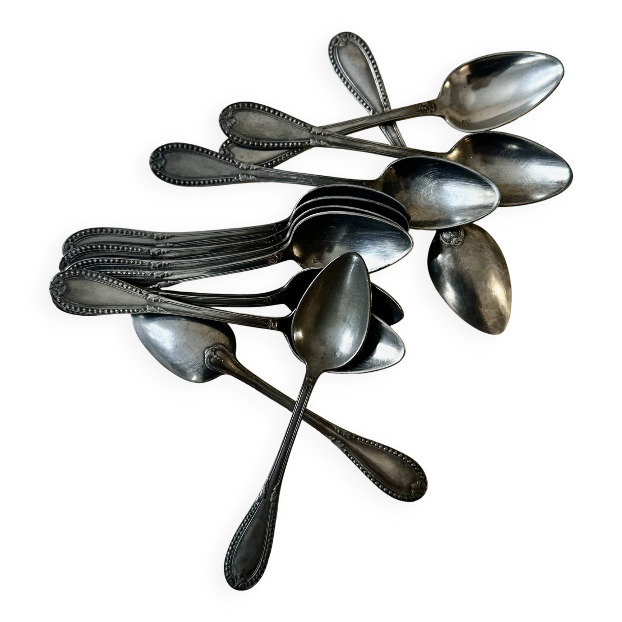 Service of 12 silver-plated dessert spoons