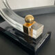 Pair of Hollywood Regency candlesticks in lucite and brass