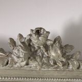 Large antique beveled mirror in carved wood painted with floral decoration and