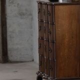 Antique baroque oak commode from the late 18th century with cabriole legs.