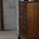 Antique baroque oak commode from the late 18th century with cabriole legs.