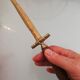 Sword-shaped letter opener paper cutter with turned wooden handle
