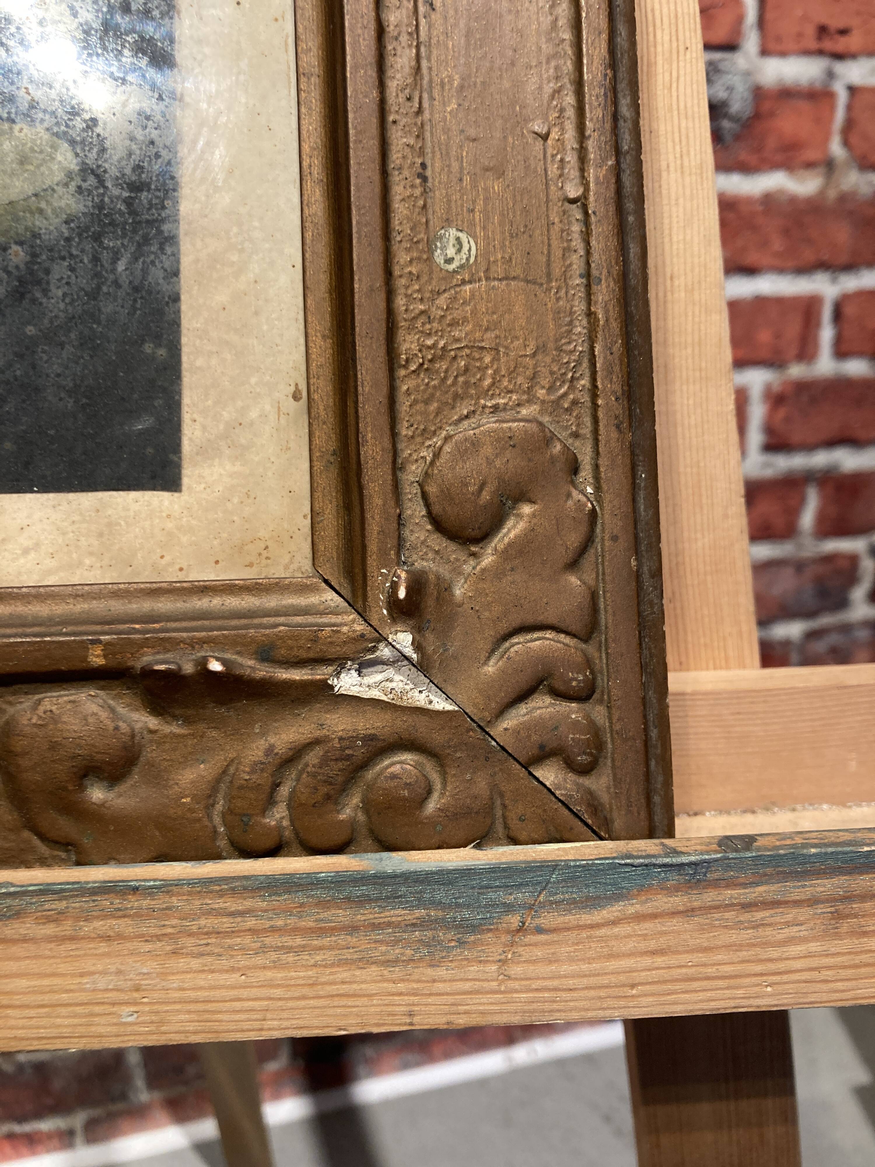 Framed painting of a man on mica.