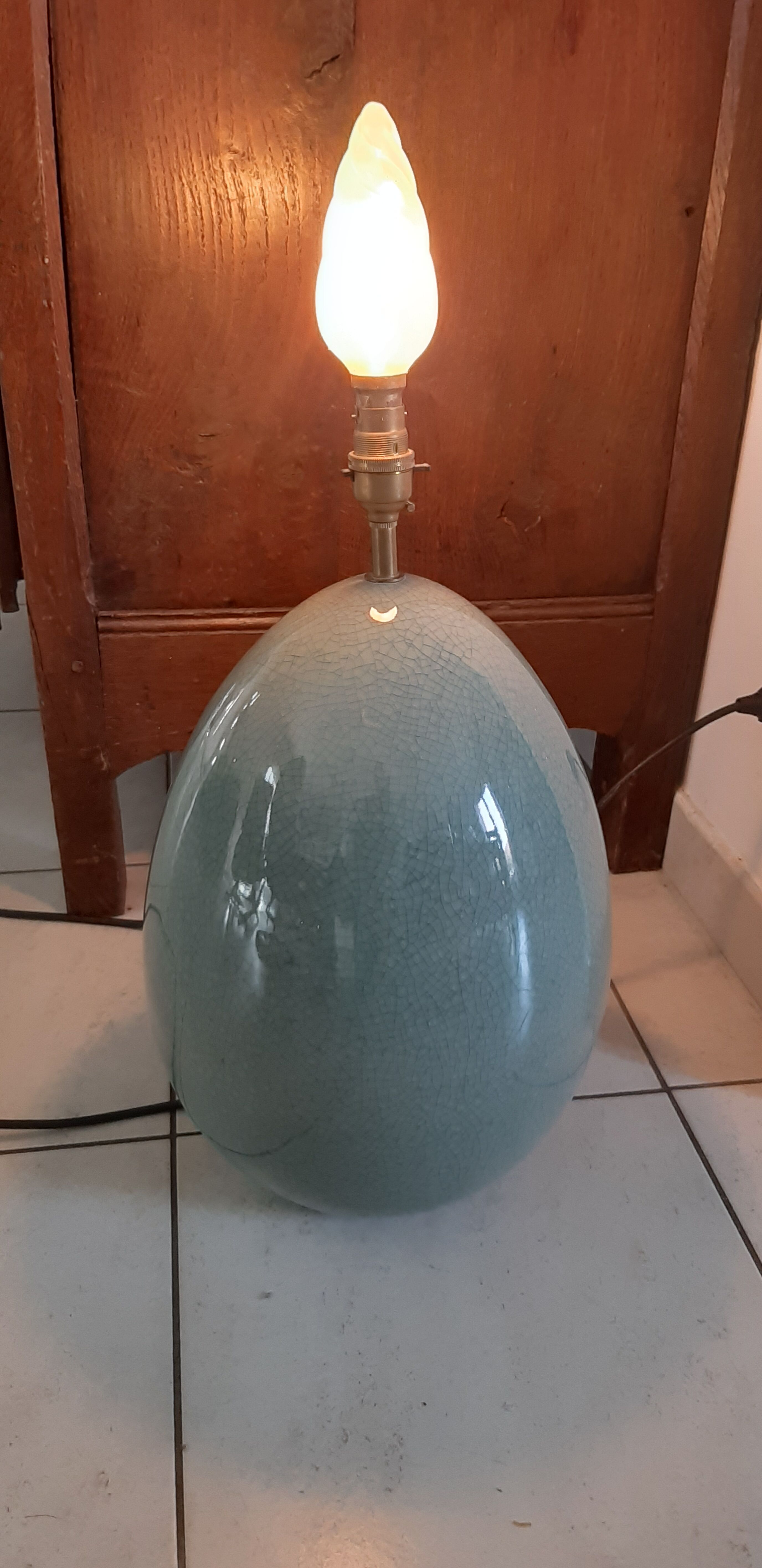 Celadon green cracked earthenware egg lamp foot