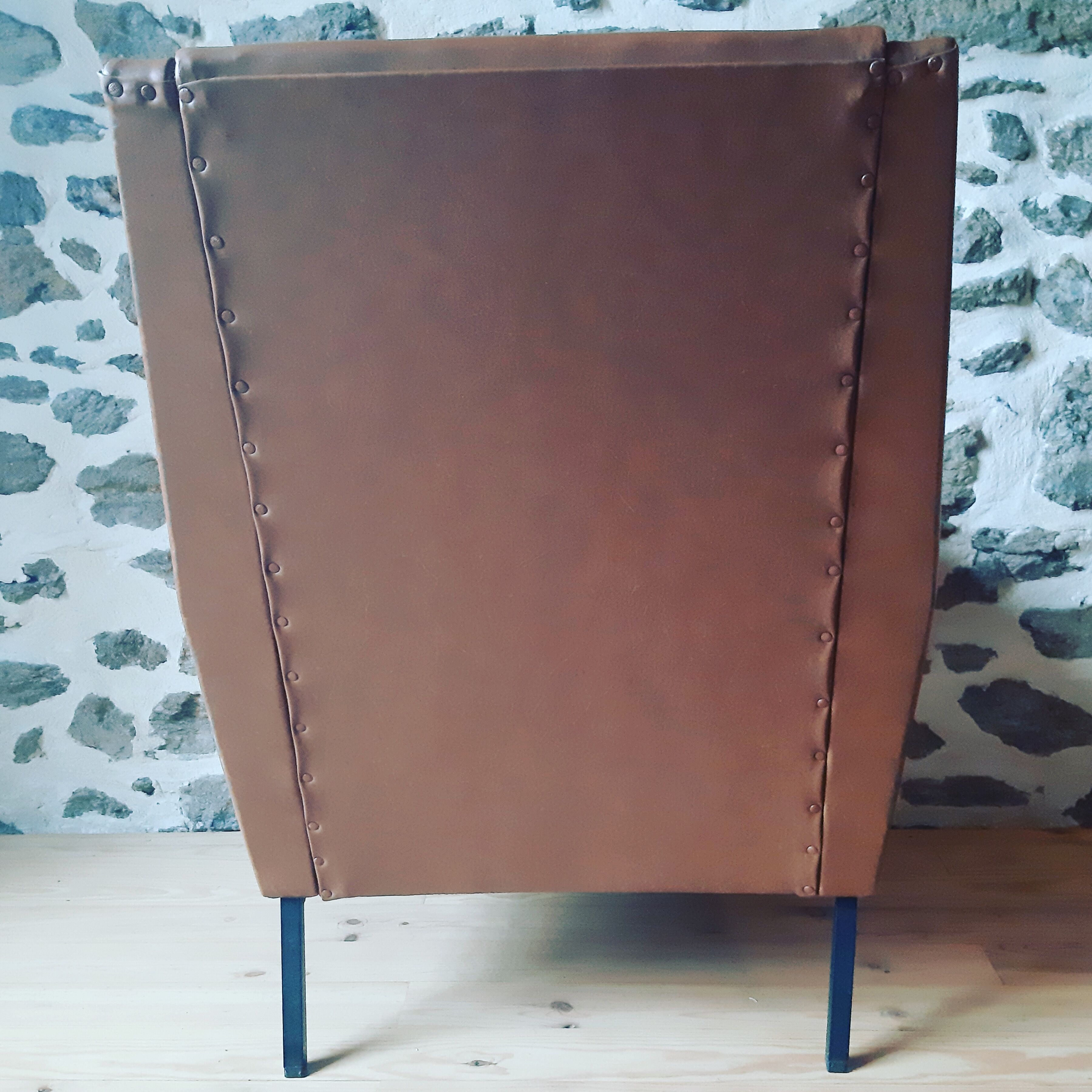 Armchair in leatherette of the 1960s