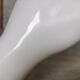 White ceramic hand wall lamp