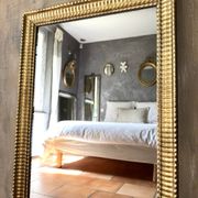 Antique Napoleon III gilded mirror from the 19th century.
