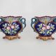 Pair of antique Art Nouveau dragon slip planters
