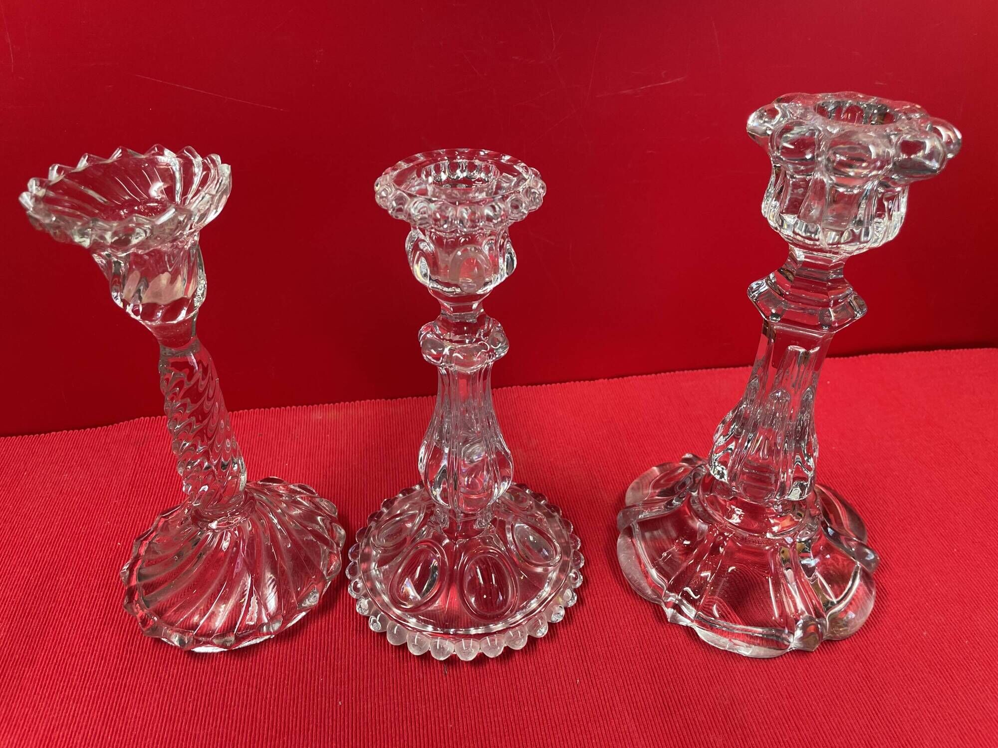 Set of 3 different candle holders, molded glass, very trendy 20 to 22 cm