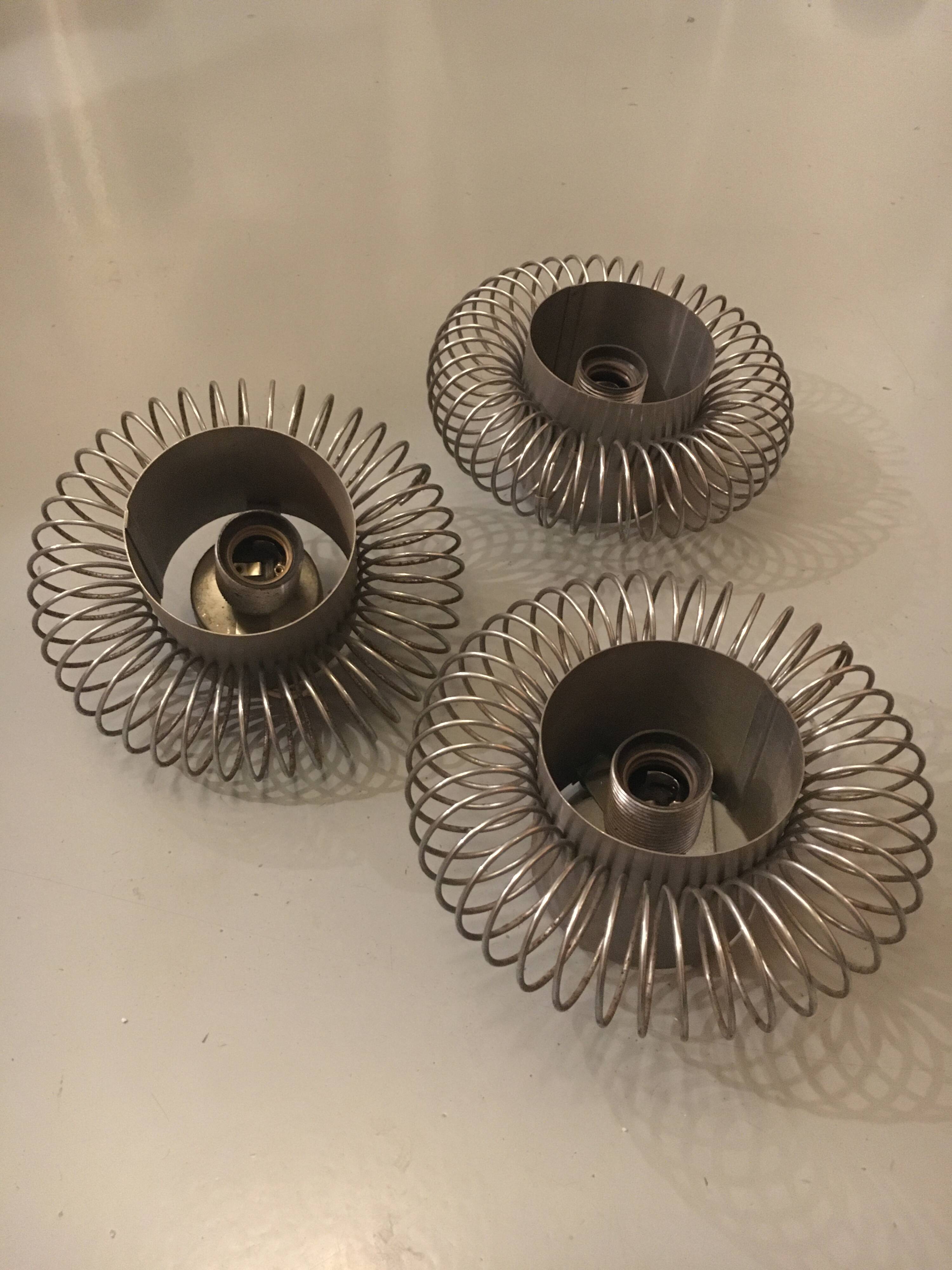 Set of 3 “spring” design wall lights in chrome metal, 1970s, in the spirit of Andrea Lazzari