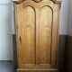 Large country pine bonnetière with carved details.