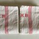 Paire de torchons en lin réserve de trousseau monogramme AB