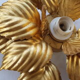 Golden metal flower sconce