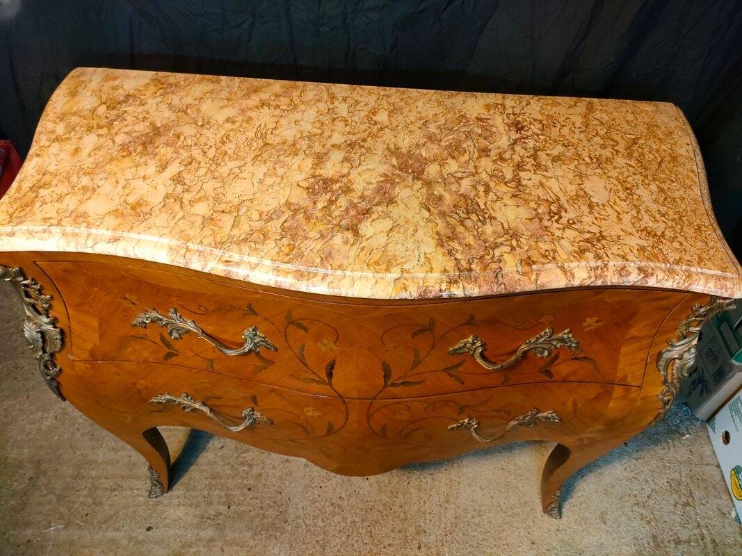 Louis XV style commode with marquetry and marble.
