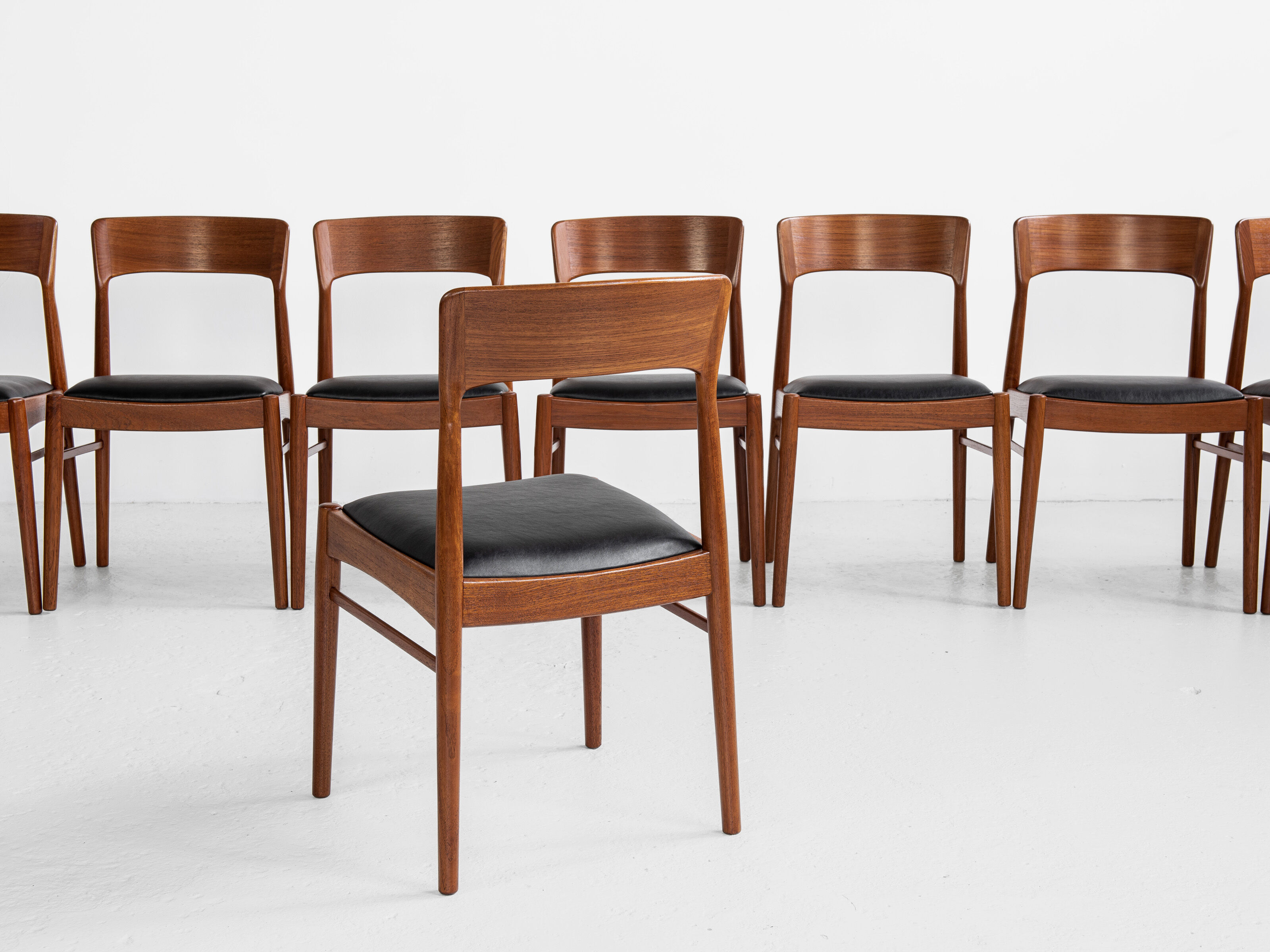 Midcentury Danish set of 8 dining chairs in teak by Henning Kjaernulf for Korup Stolefabrik